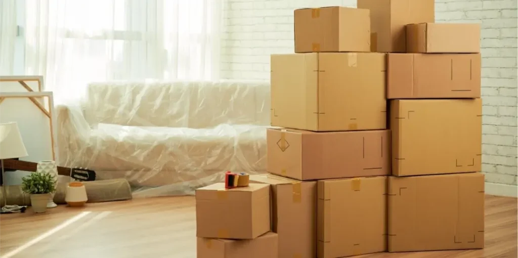 multiple packing boxes in front of a couch