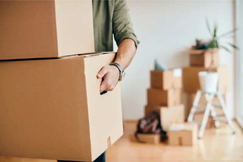 local movers helping out with packing and moving boxes